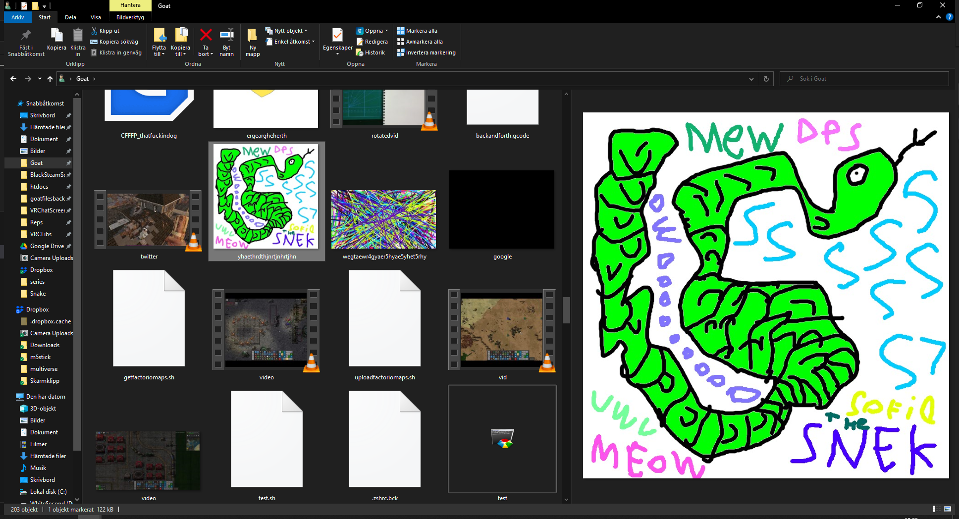 
Windows Explorer in dark mode showing a folder with many files and there is a bar to the left that shows various folders through quick access and dropbox and a computer icon each with many folders in them. The main window shows around 16 files with big icons with preview for the images. To the right is a preview of a poorly drawn snake that says mew among other things. There is a top bar too that lets you copy stuff and create folders and such.
